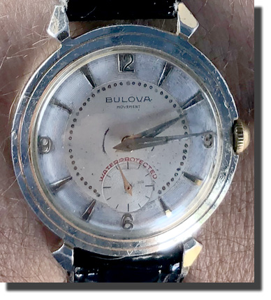 Bulova blue round wristwatch