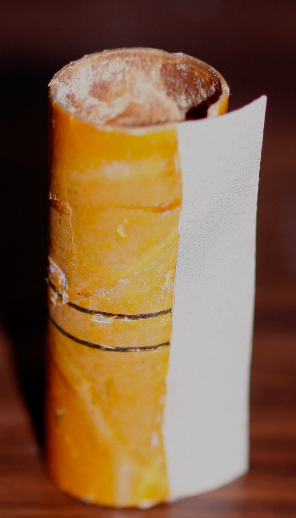 Cap shell--half the backing tongue glued in place